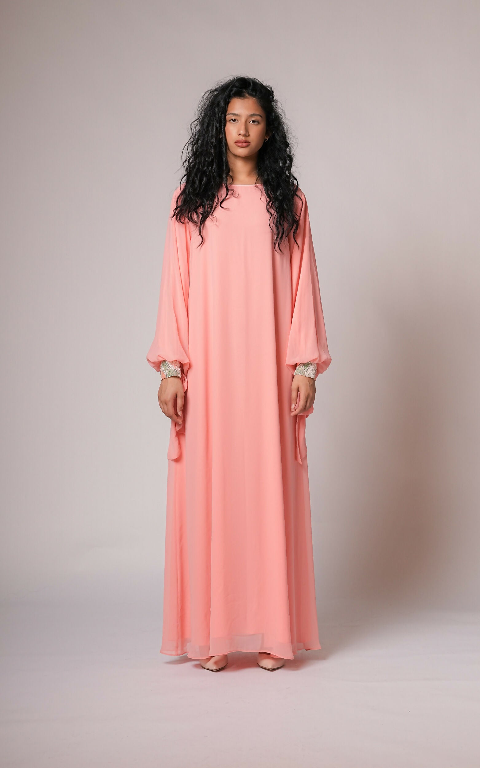Kaftan dress embellished with sequins in peach