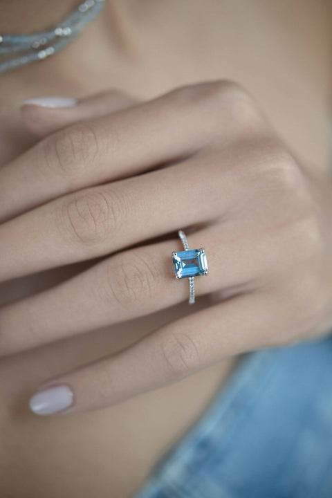 Ring with a light-blue stone