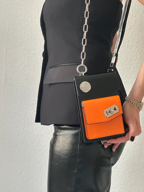 Black & Orange Crossbody Bag CRISANTA Two-Tone Crossbody Mini Bag in Black & Orange with Silver Details