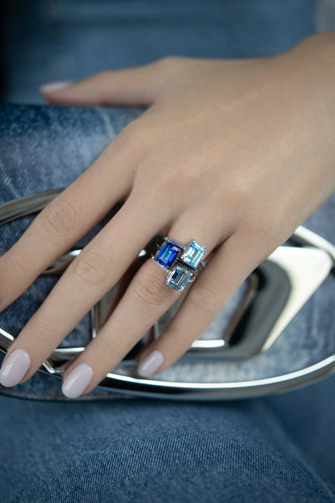 Ring with a dark-blue stone