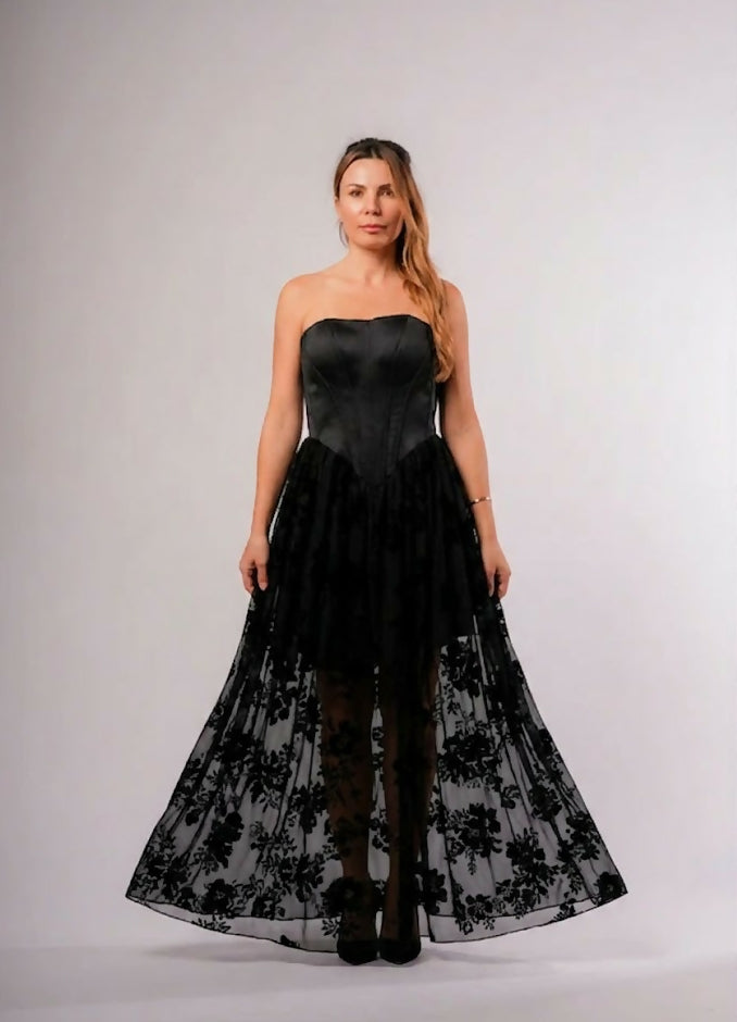 Black Corset Dress. The Bottom Of The Dress With Transparent Flowers