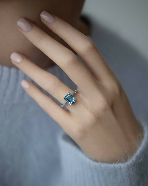 Ring with a blue stone