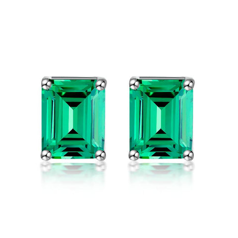 Green stud earrings in emerald cut