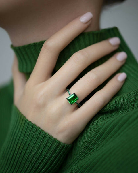 Ring with a green stone