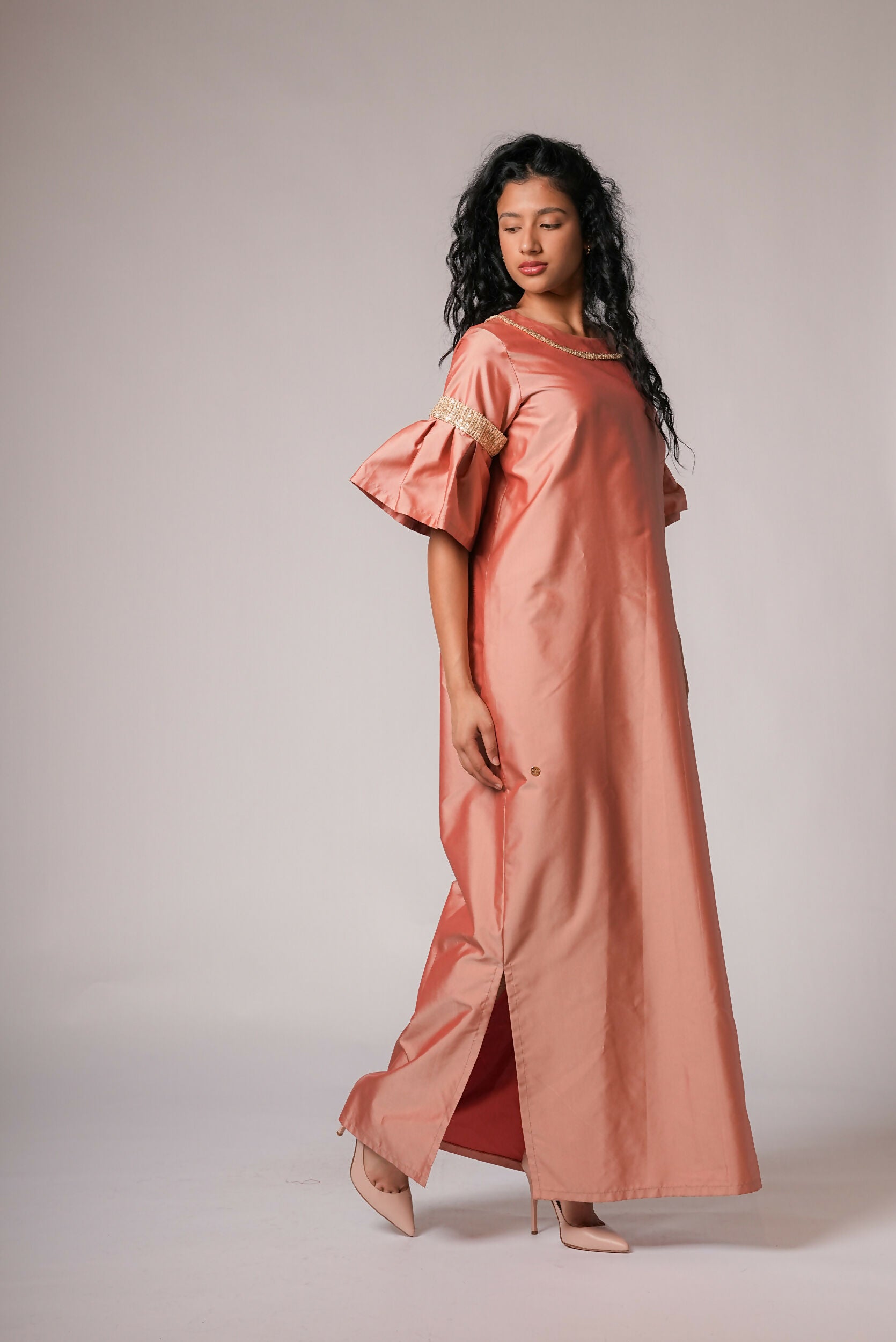 Kaftan dress embellished with sequins in peach