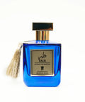 tair-niche-fragrance-dubai-blue-bottle-gold-cap-tassel