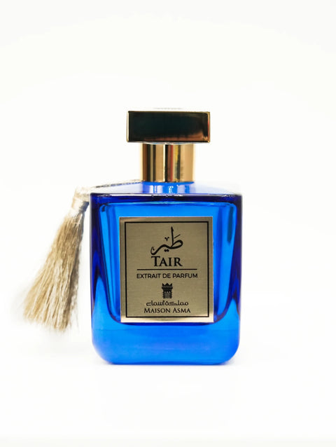 tair-niche-fragrance-dubai-blue-bottle-gold-cap-tassel
