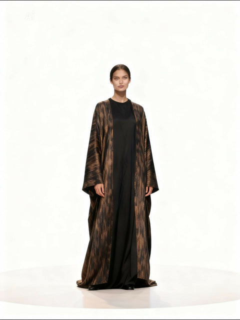 Modern women’s abaya consisting of tow pieces decorated