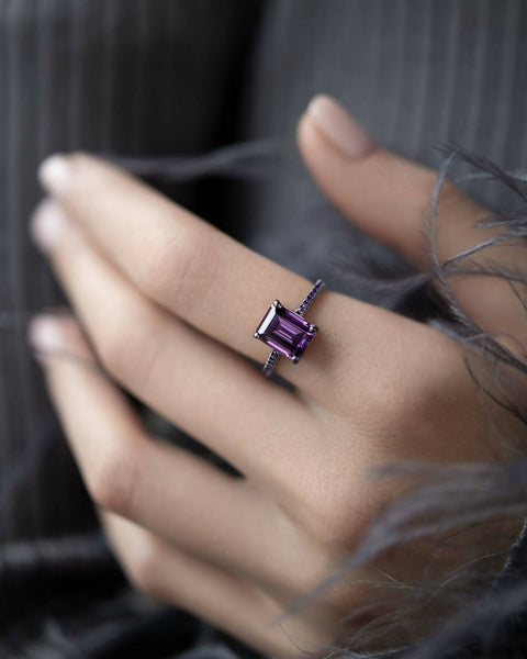 Ring with a purple stone