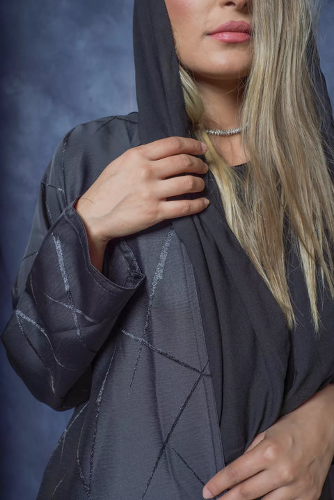 Elegant Modern women’s abaya consisting of three pieces decorated with scarf