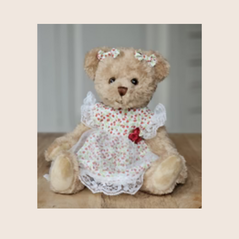 Girl Bear with dress and red flowers.