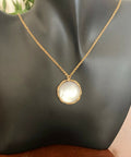 MOTHER OF PEARL BLACK ROUND PENDANT
