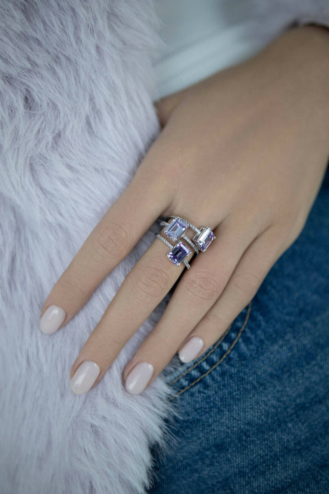 Ring with a purple stone